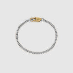 A silver-toned chain bracelet with a gold-toned lobster clasp, displayed on a light gray background.