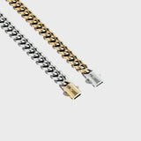 Gold chain with silver clasp and silver chain with gold clasp on a white background - side by side 