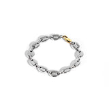 Silver mariner bracelet with gold oval clasp on white background