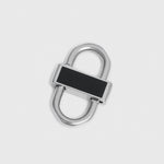 A silver-toned metal lock with a black rectangular inlay on the front, shown on a plain light gray background.