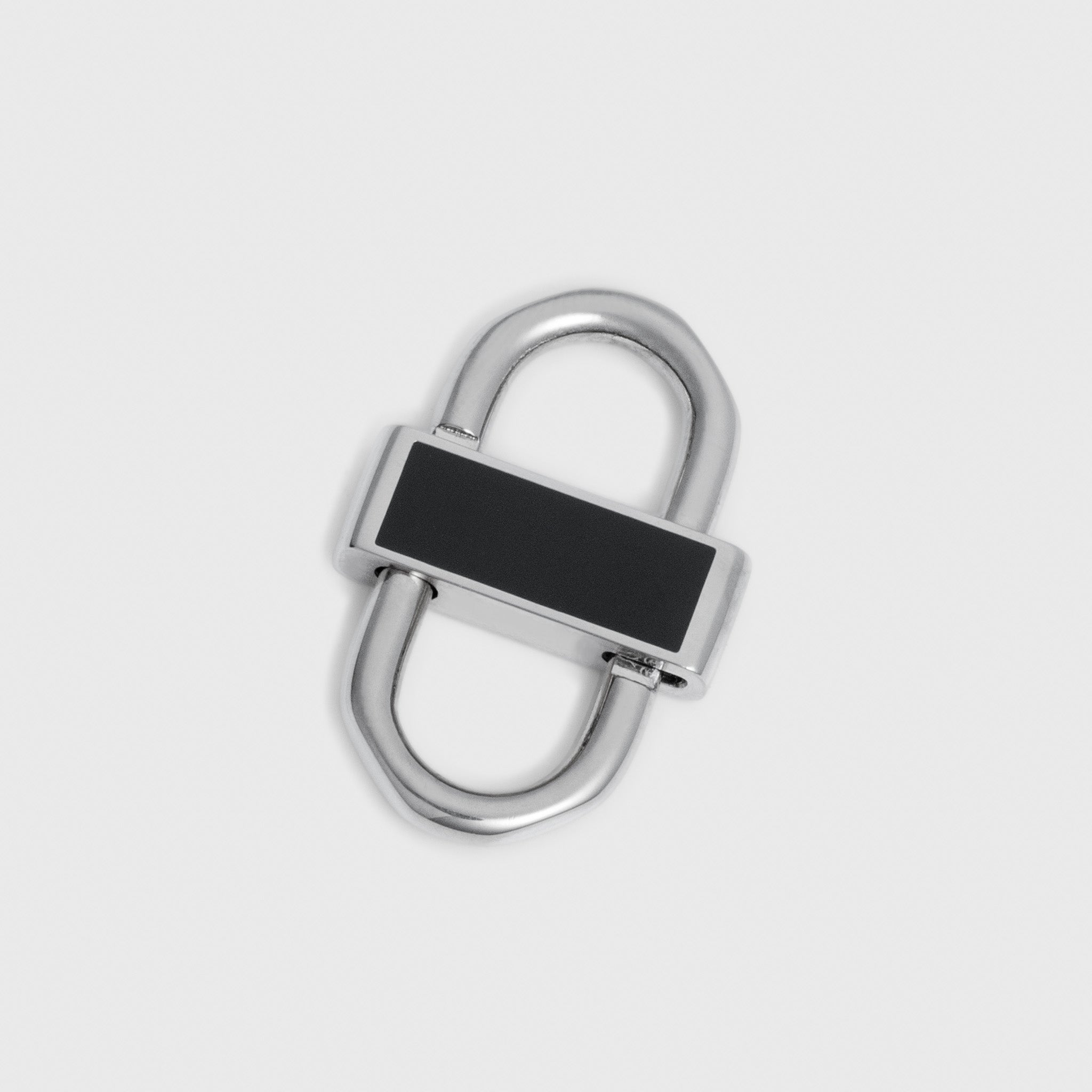 A silver-toned metal lock with a black rectangular inlay on the front, shown on a plain light gray background.