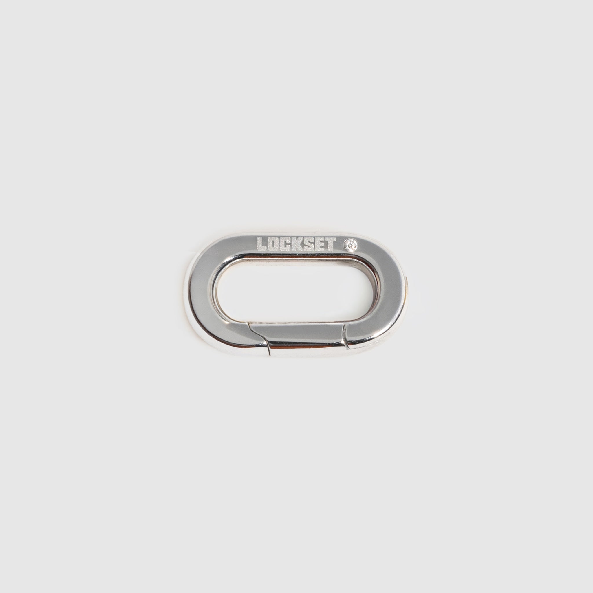 A silver metal carabiner clip with the brand name "Lockset" engraved on the top loop, centered on a light gray background.