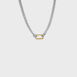 Silver cuban chain with gold carabiner clasp on white background