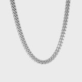Thick silver cuban chain on white background