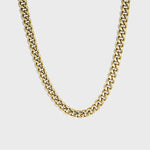 Thick gold cuban chain on white background