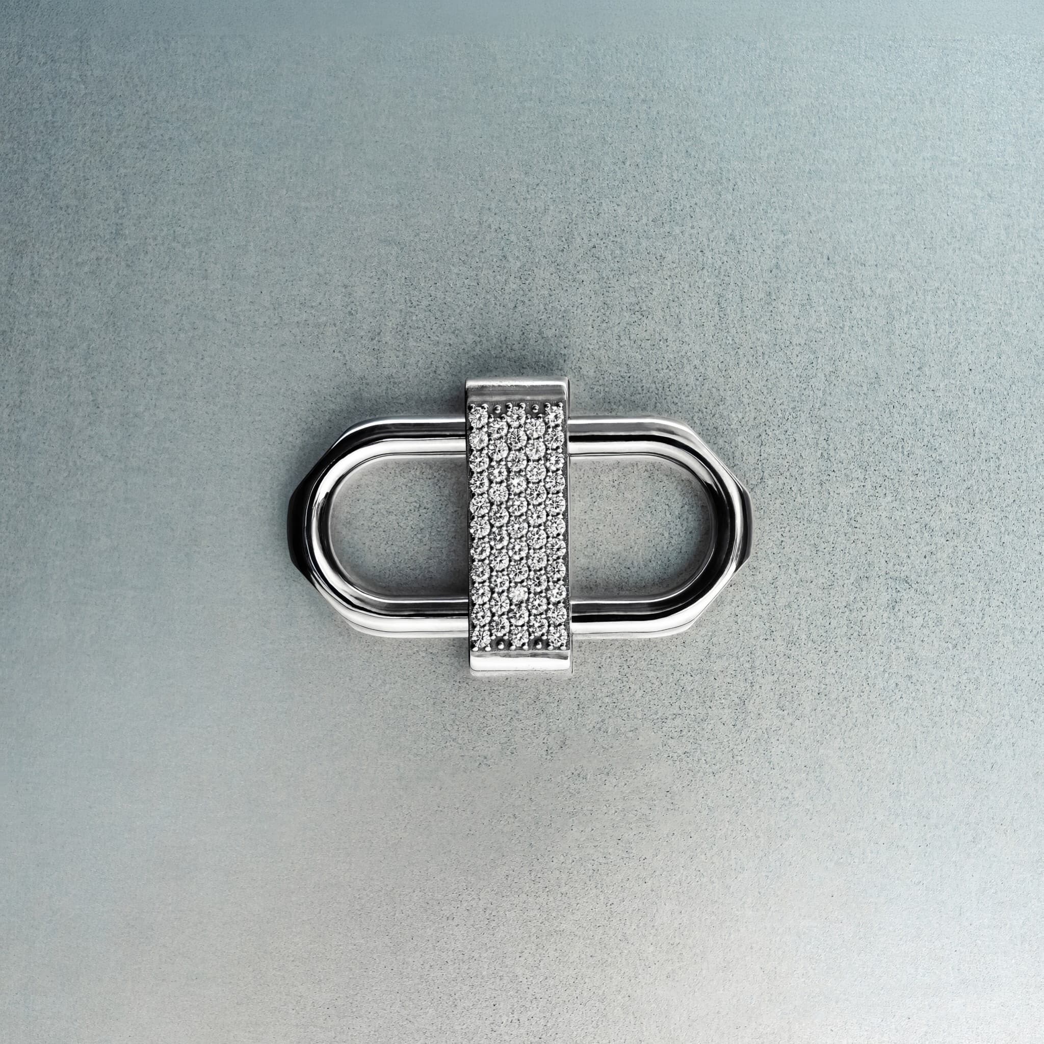Silver double lock pendant featuring centered diamond detail on gray background