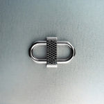 Silver double lock pendant featuring centered black diamond detail on gray background