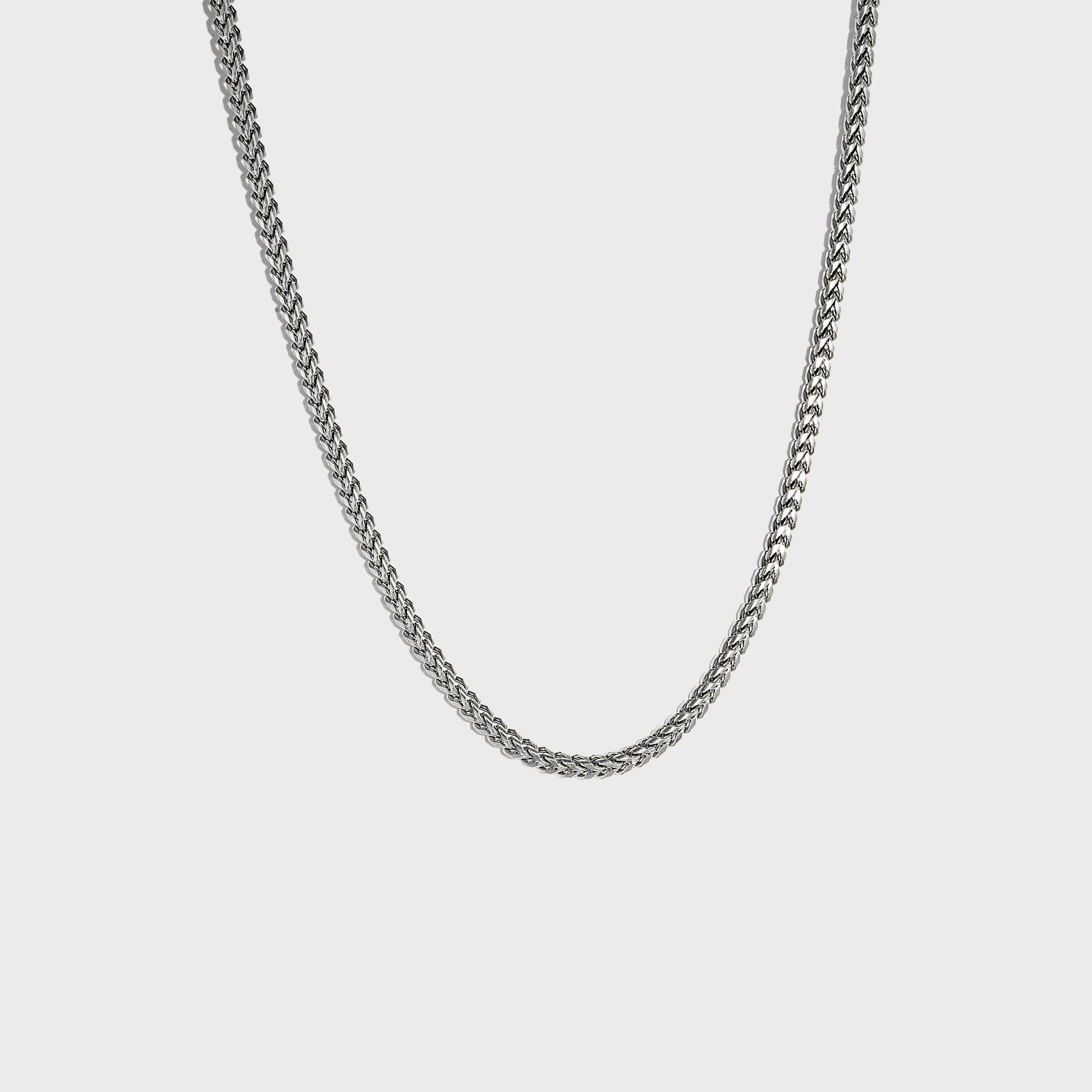 Silver chain on white background