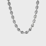 Silver mariner-link chain on white background