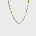 Gold mariner link chain with silver carabiner clasp on white background