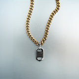 Gold chain necklace with rectangular six-sided silver lock pendant featuring centered diamond cluster and cutout detailing