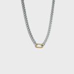 Thick silver rolo chain necklace with gold carabiner clasp on white background