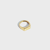 Gold rectangular signet ring on white background