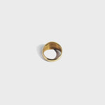 Gold ring on white background
