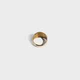 Gold ring on white background
