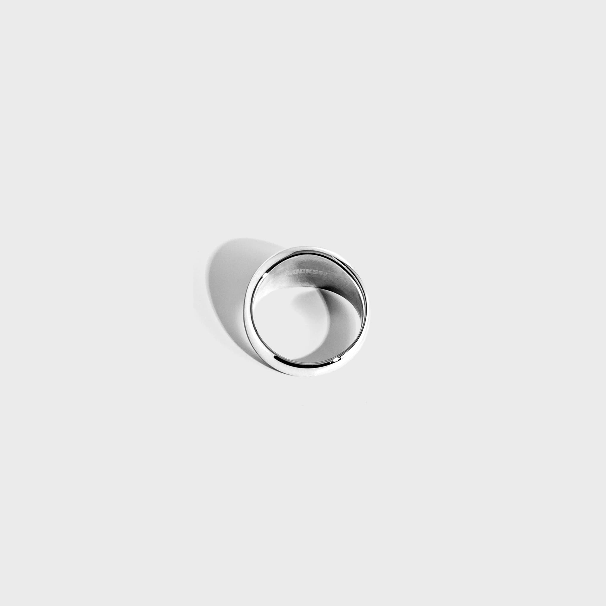 Silver ring on white background
